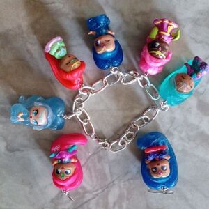 Whimsical Silver Charm Bracelet with Colorful Figures